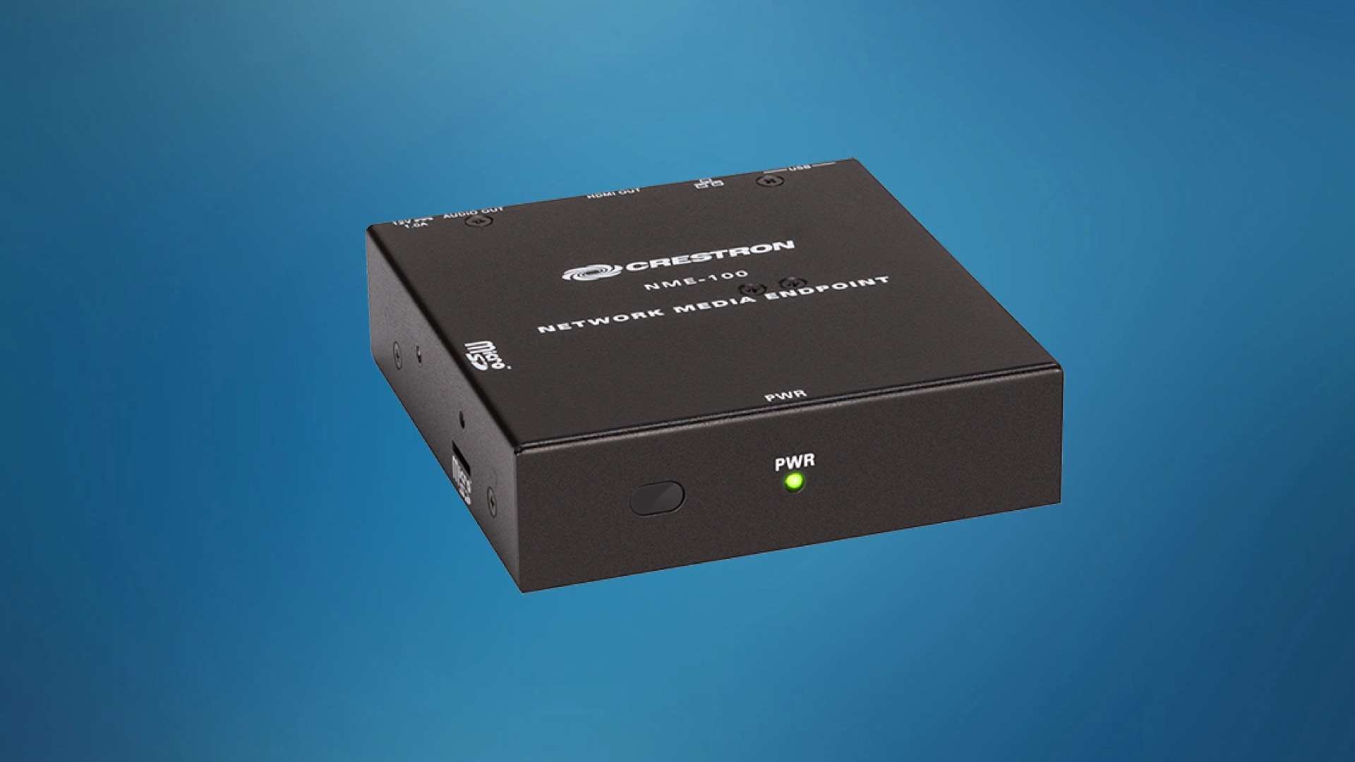 A Crestron NME-100 Network Media Endpoint device is shown against a blue background. The black box features connectivity ports and an illuminated power indicator light.