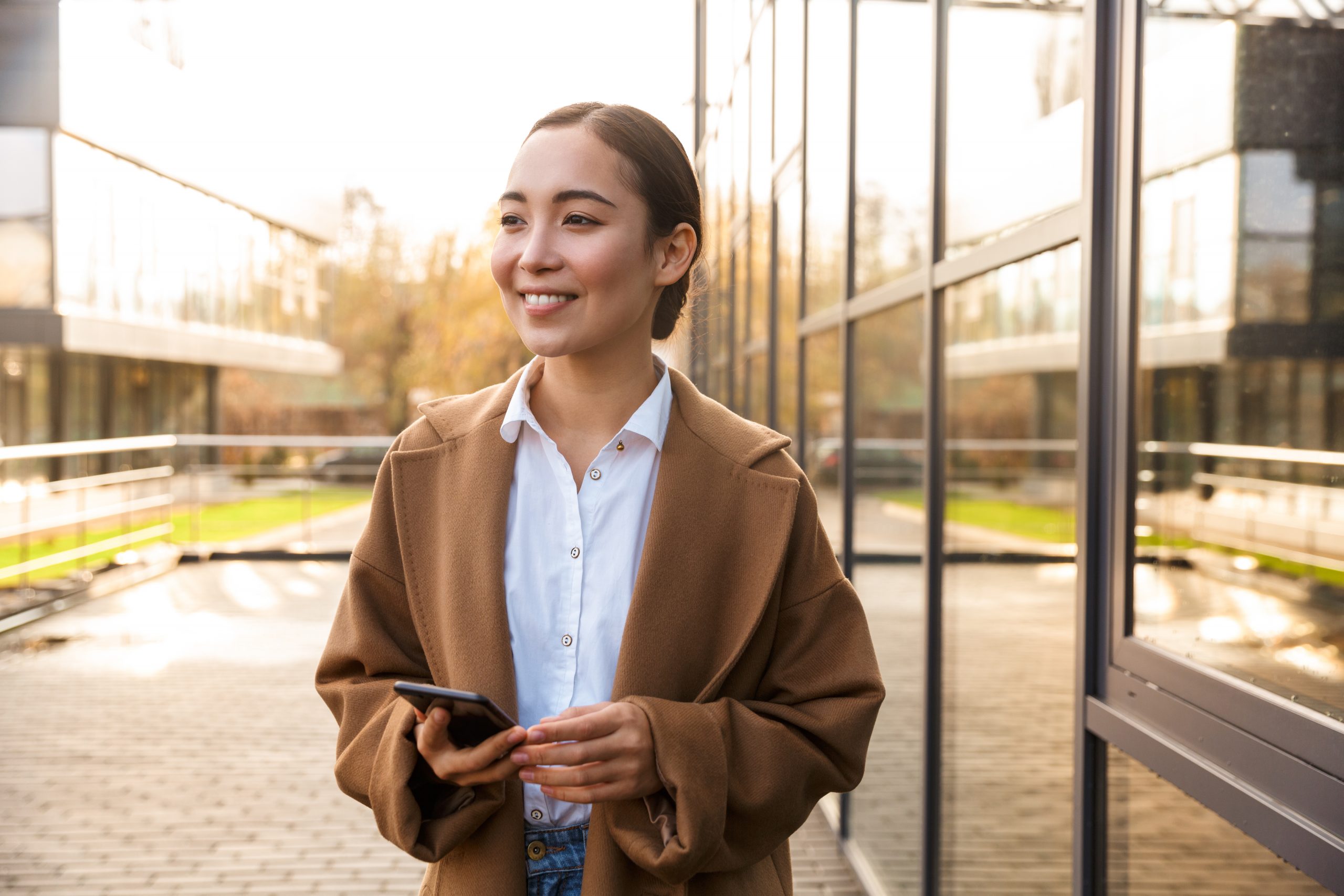 woman using mobile intranet app