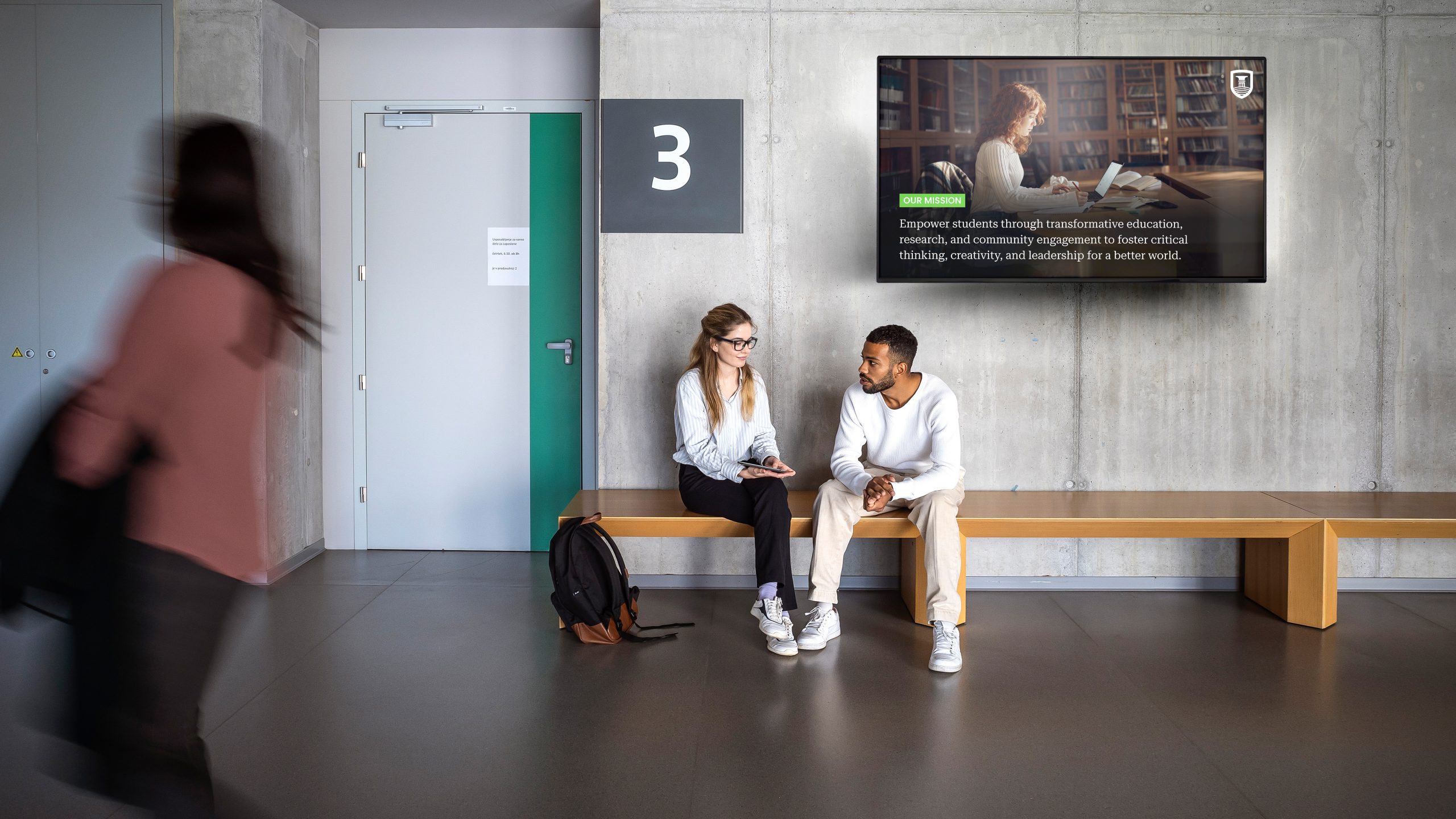 Diverse Students Engage in Conversation at University