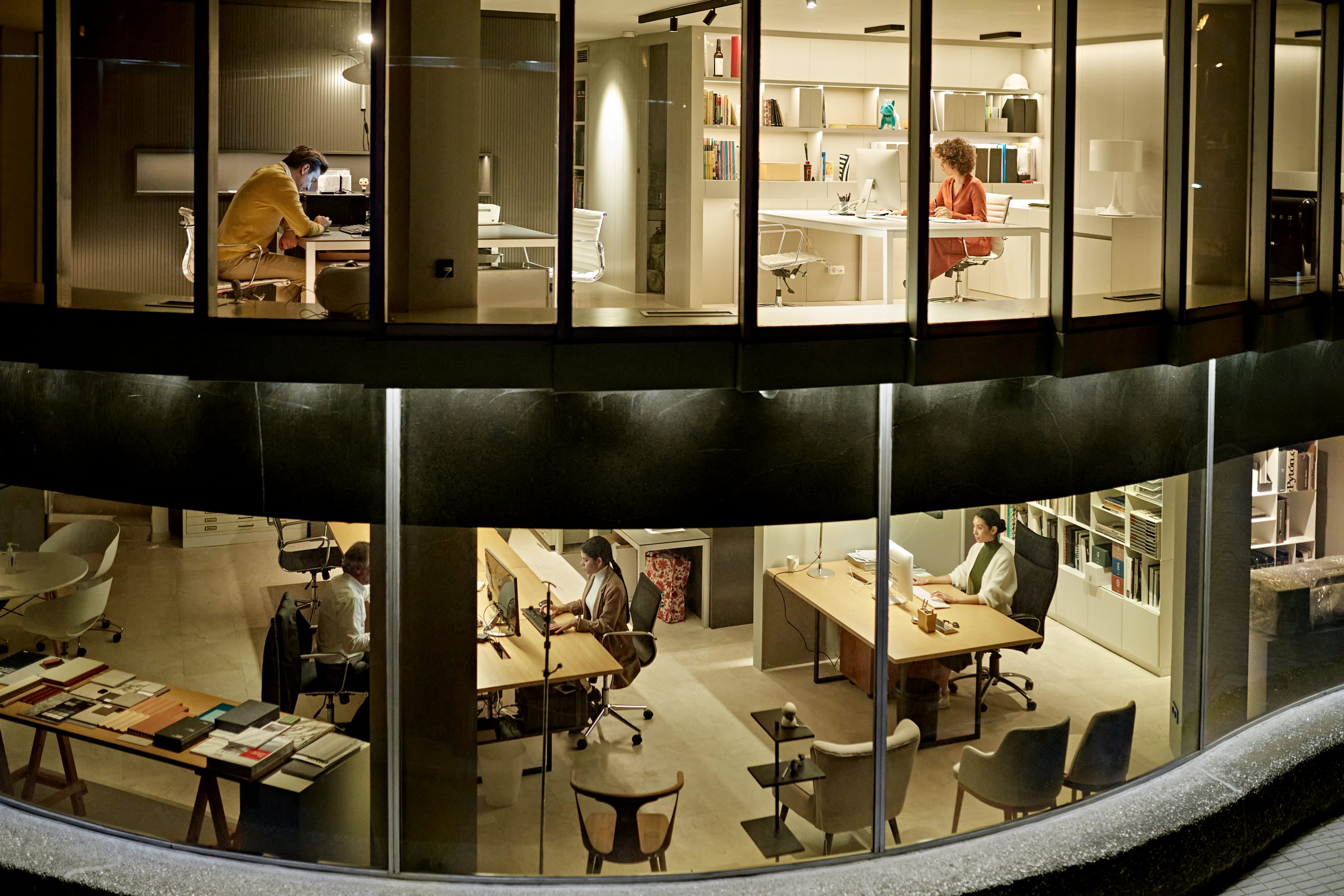 Design Professionals Working Late in Two-Story Office