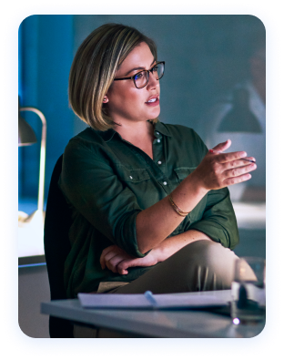 Professional woman having a conversation in an office.