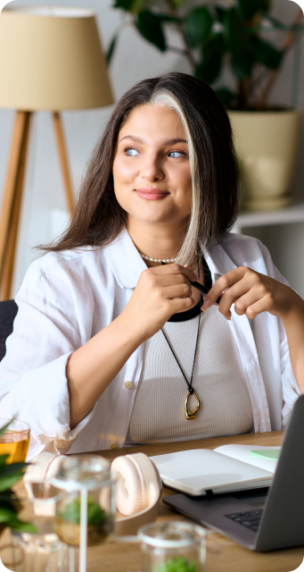 Professional woman smiling in her office.