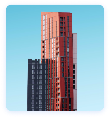 View of two-tone corporate office against a clear sky.